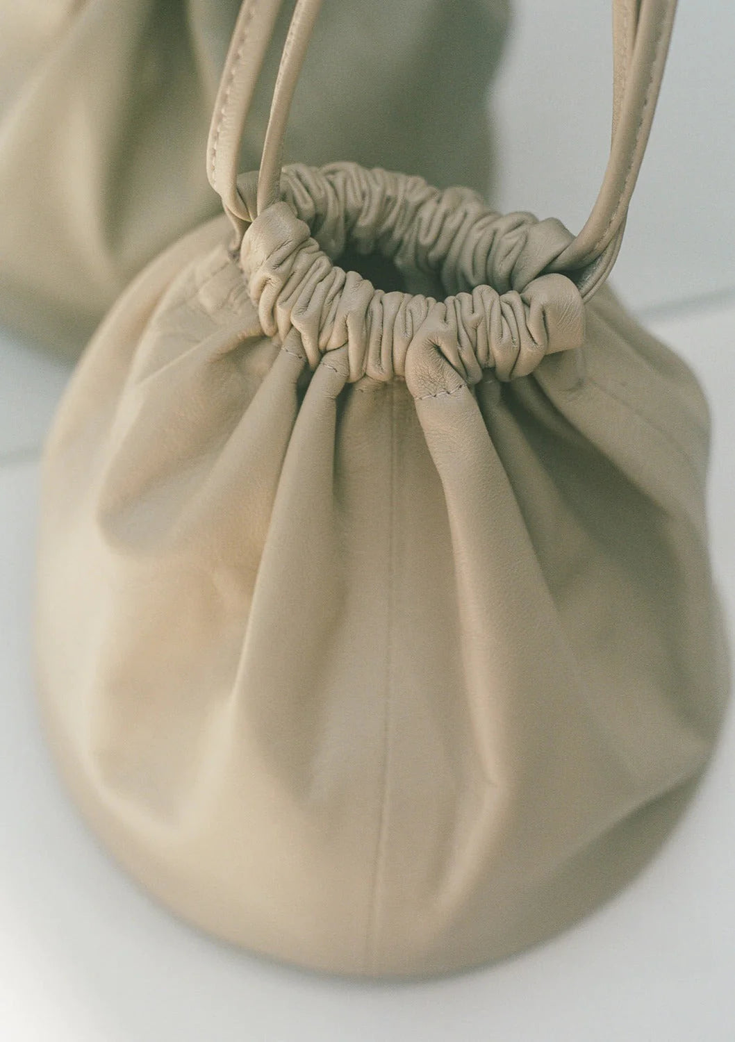 Creme Mini Drum Drawstring Bucket Bag