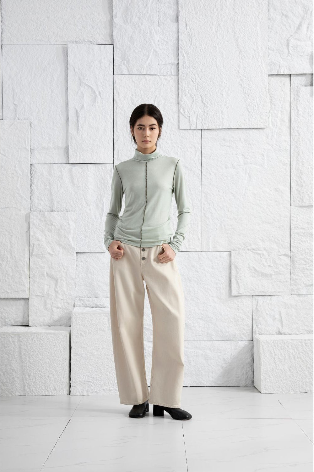 Exposed Seam Turtleneck Top